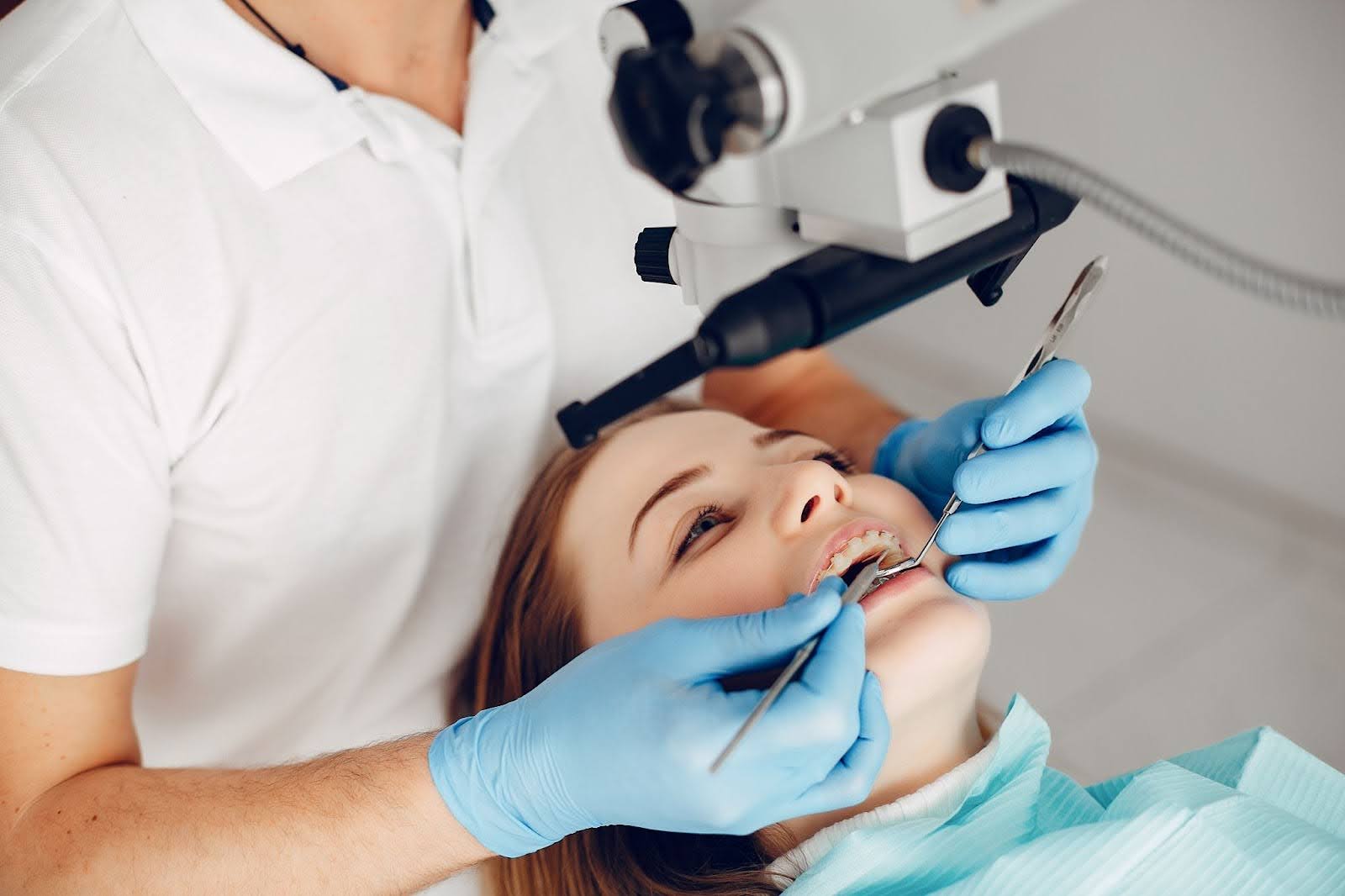 A woman at the dentist.